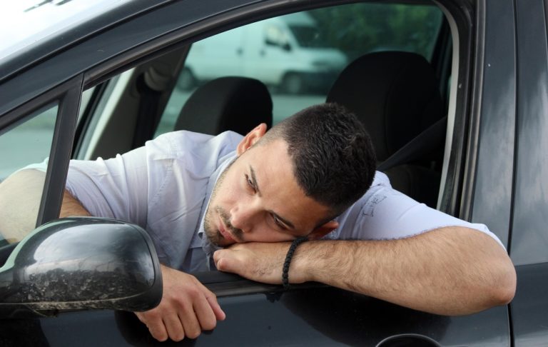 danger sleepy man driving